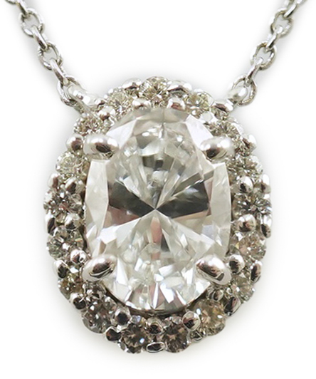 A modern 18k white gold and solitaire oval brilliant cut diamond set pendant necklace